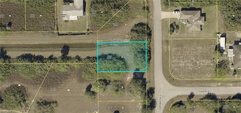 410 Chamonix AVE S, LEHIGH ACRES FL 33974-1