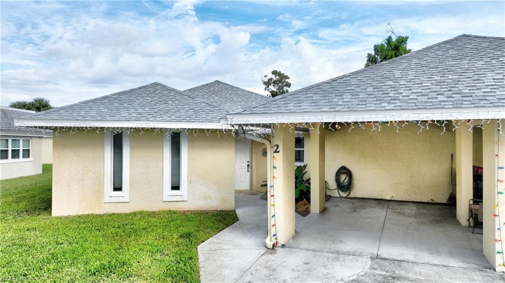 2 E Greens CIR, LEHIGH ACRES FL 33936-4