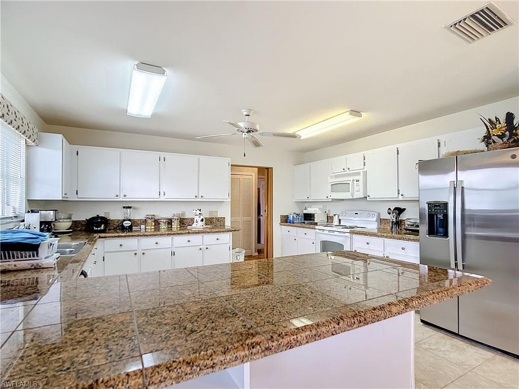 7397 Grande Pine RD, BOKEELIA FL 33922-13