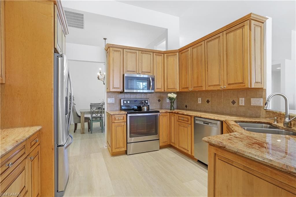 7699 Groves RD, NAPLES FL 34109-10