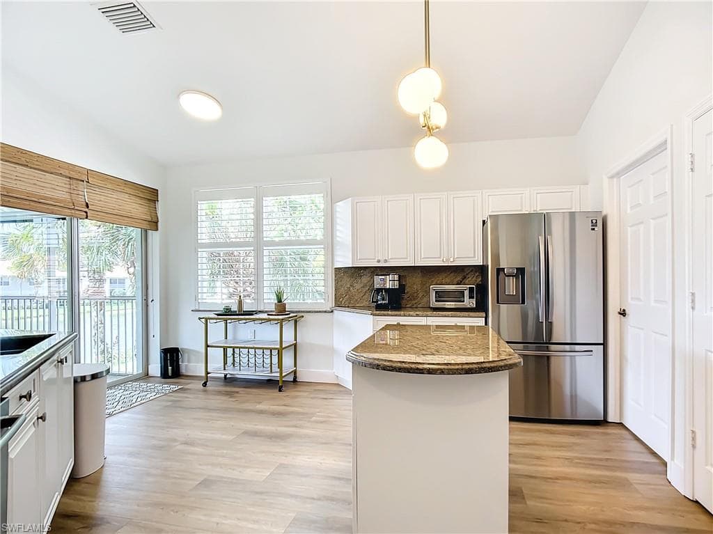 3077 Windsong CT # 704, NAPLES FL 34109-14