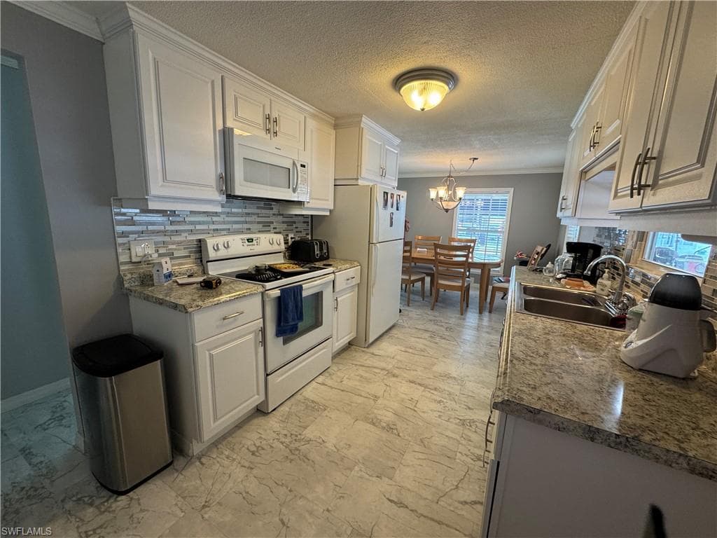 84 Enchanting BLVD, NAPLES FL 34112-16