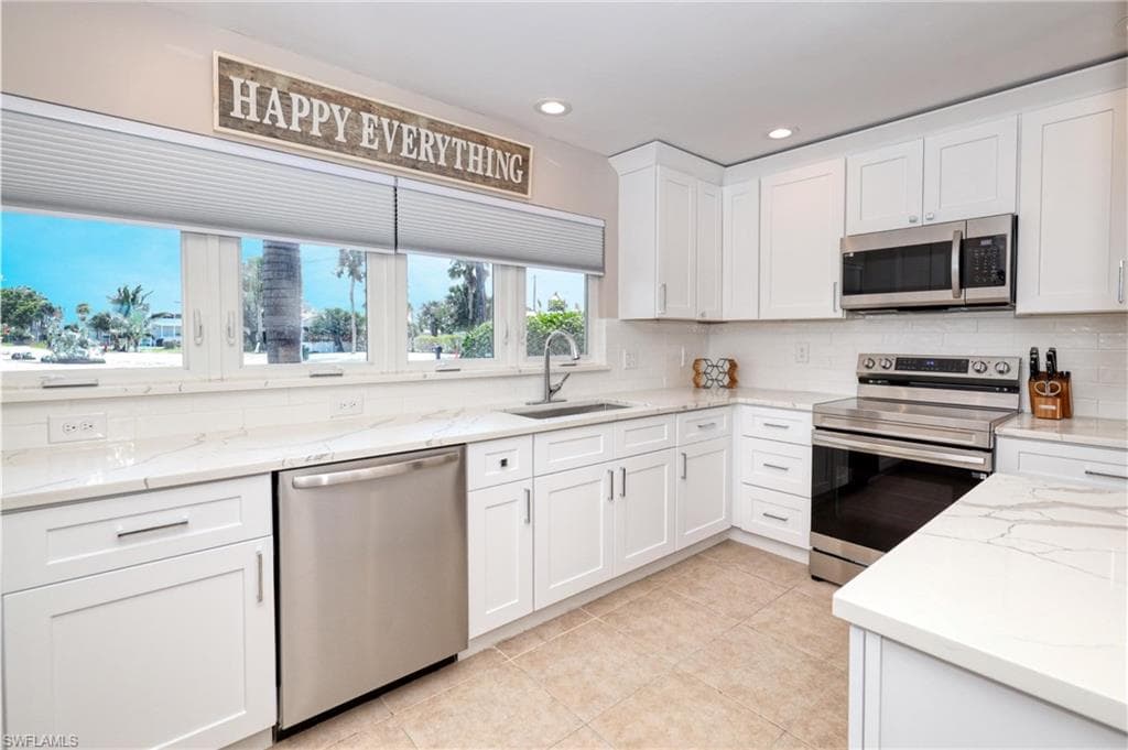 309 Madison CT, FORT MYERS BEACH FL 33931-2