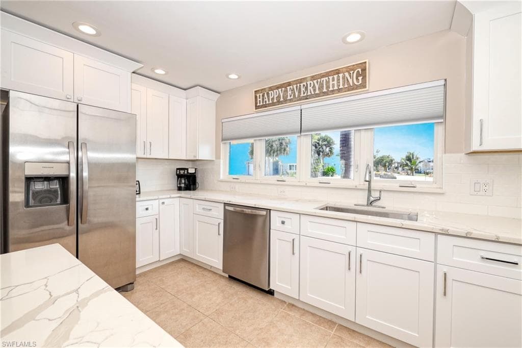 309 Madison CT, FORT MYERS BEACH FL 33931-3