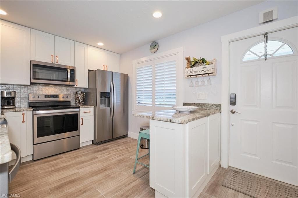 5027 SW 16th PL # 103, CAPE CORAL FL 33914-4