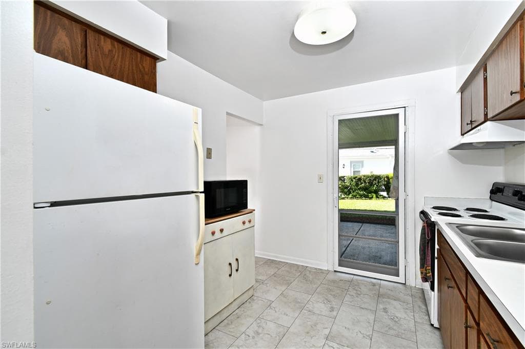 26 Pinewood BLVD, LEHIGH ACRES FL 33936-3