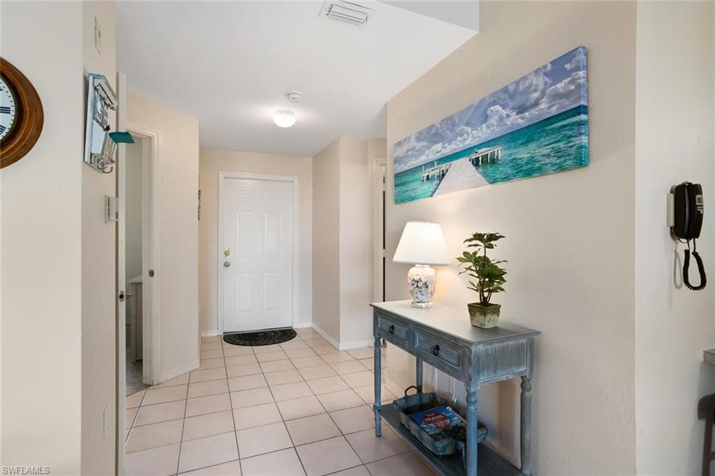 519 ROMA CT # 306, NAPLES FL 34110-2