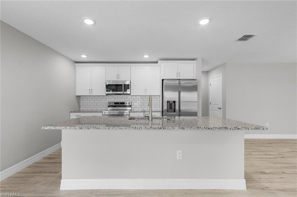 337 Woodburn DR, LEHIGH ACRES FL 33972-9