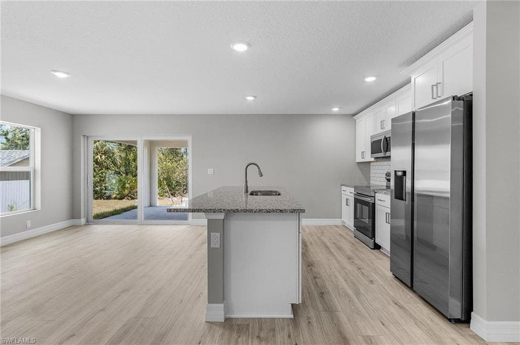 337 Woodburn DR, LEHIGH ACRES FL 33972-10