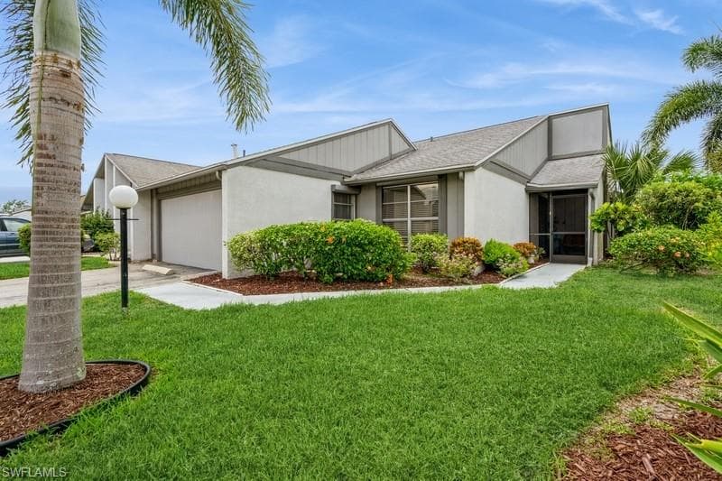 9749 Maplecrest CIR, LEHIGH ACRES FL 33936-40