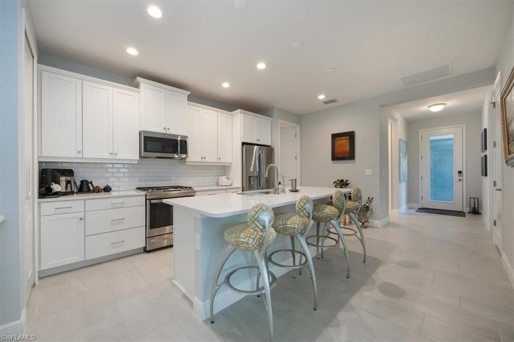 2401 Ariane DR, NAPLES FL 34112-3