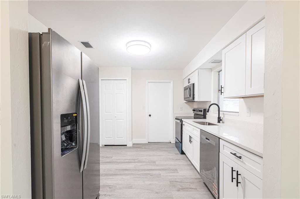 818 Gardenside CT, LEHIGH ACRES FL 33936-10