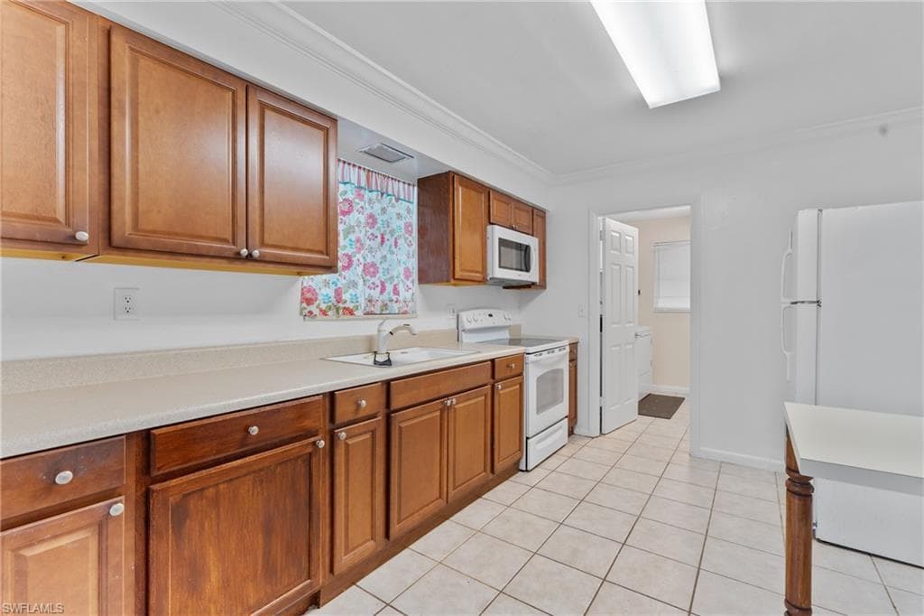 312 Grovewood AVE S, LEHIGH ACRES FL 33936-11