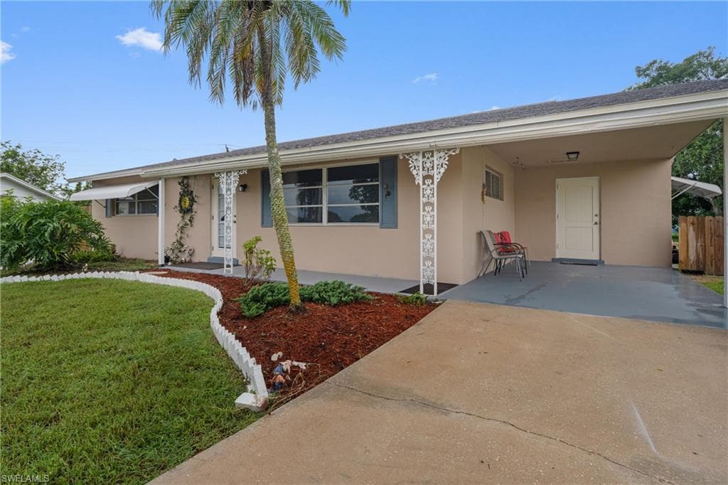 312 Grovewood AVE S, LEHIGH ACRES FL 33936-2