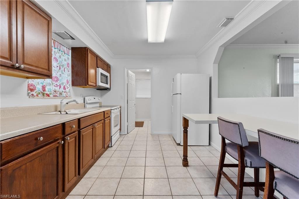 312 Grovewood AVE S, LEHIGH ACRES FL 33936-10