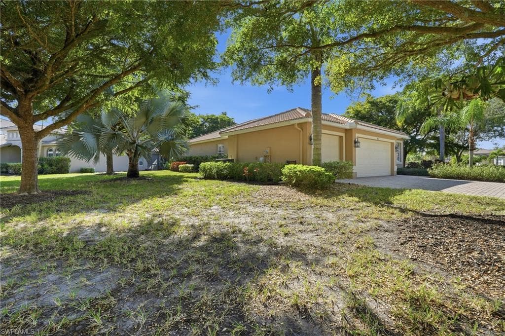 9827 Colonial WALK N, ESTERO FL 33928-40