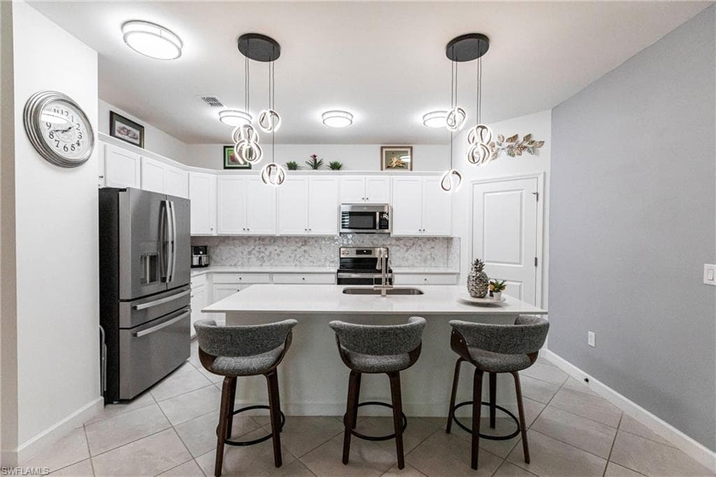 9128 Leatherwood LOOP, LEHIGH ACRES FL 33936-8