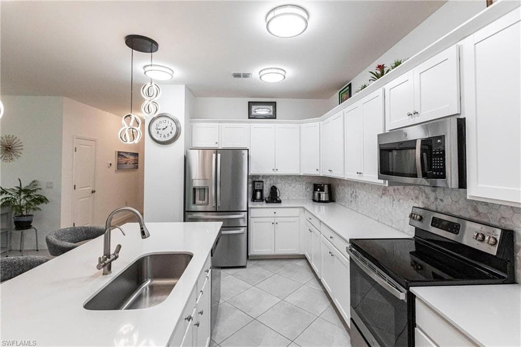 9128 Leatherwood LOOP, LEHIGH ACRES FL 33936-10