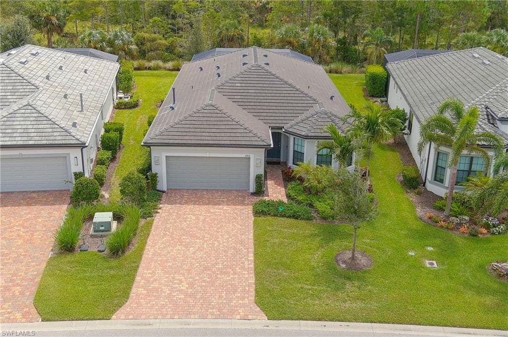 6902 Winding Cypress DR, NAPLES FL 34114-1