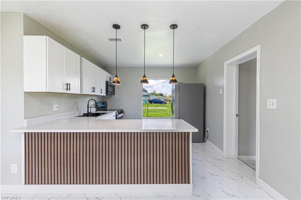 1101 Coolidge AVE, LEHIGH ACRES FL 33936-3