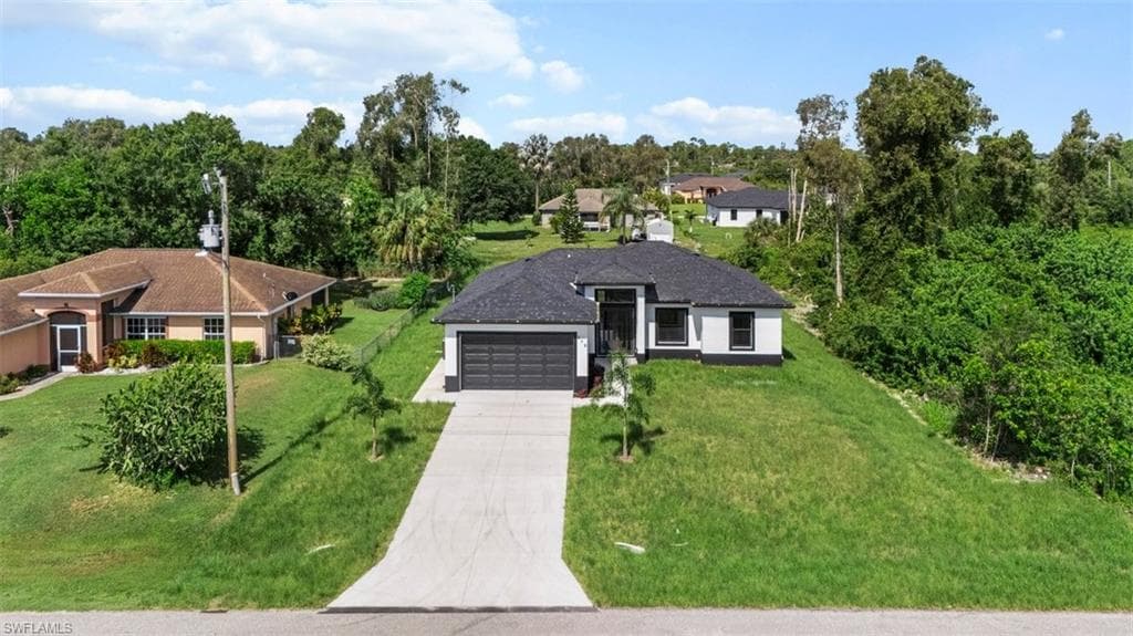 312 Ranch AVE, LEHIGH ACRES FL 33974-2