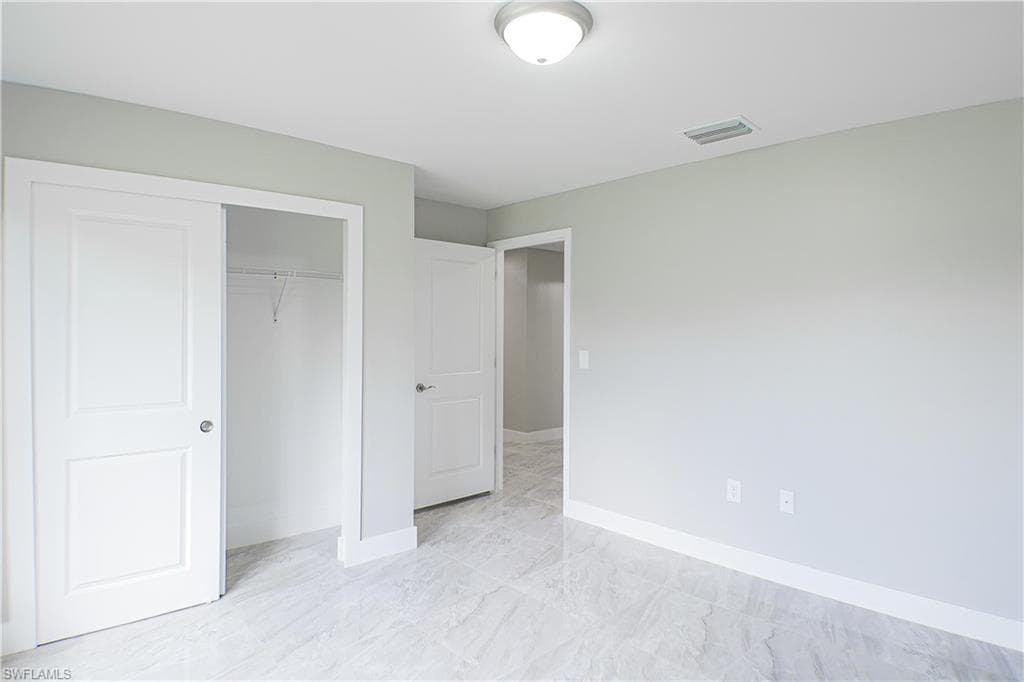 2020 E 12th ST, LEHIGH ACRES FL 33972-7