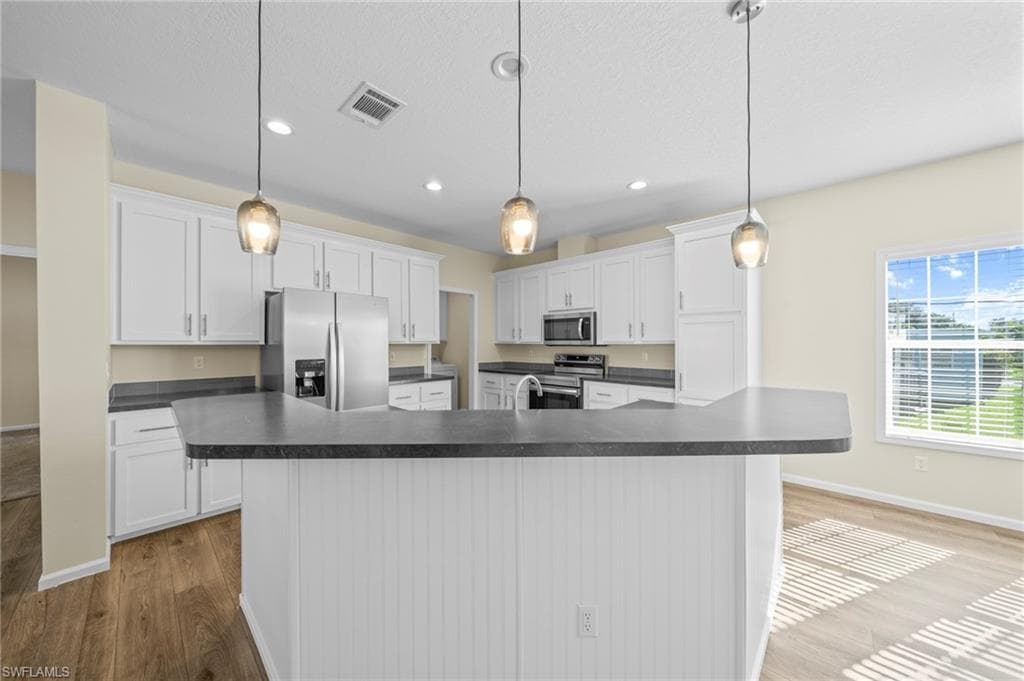 24 Red Poinciana DR, FORT MYERS FL 33908-5
