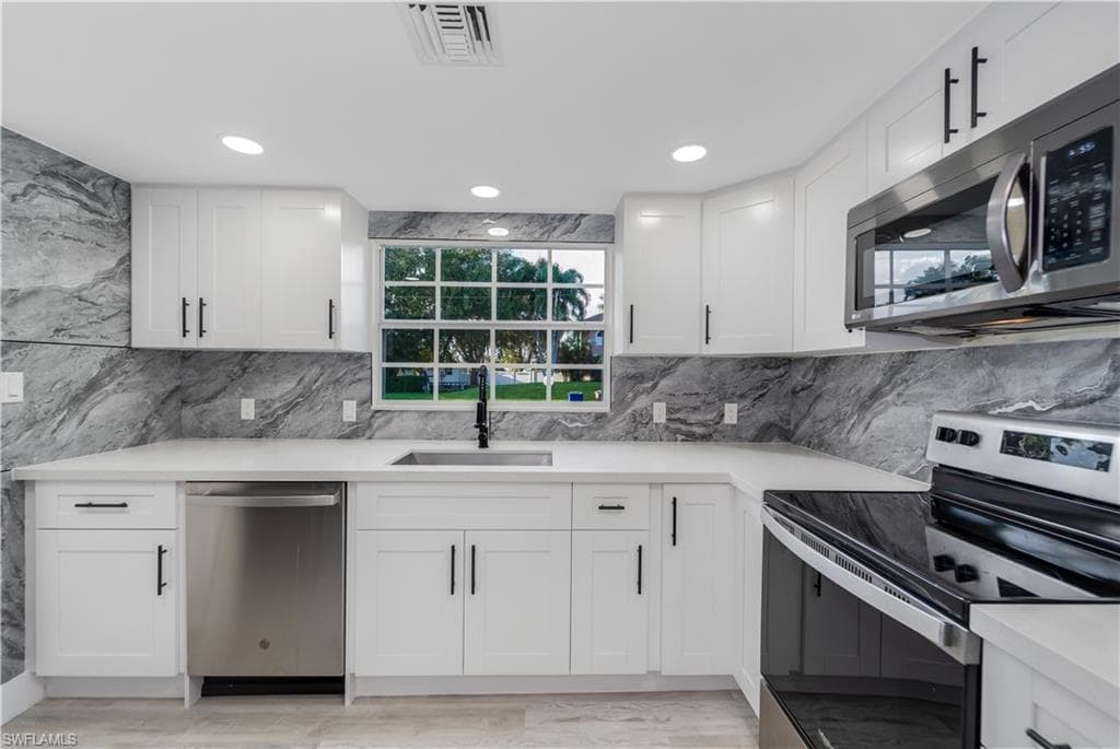 14513 Riverside DR, FORT MYERS FL 33905-3