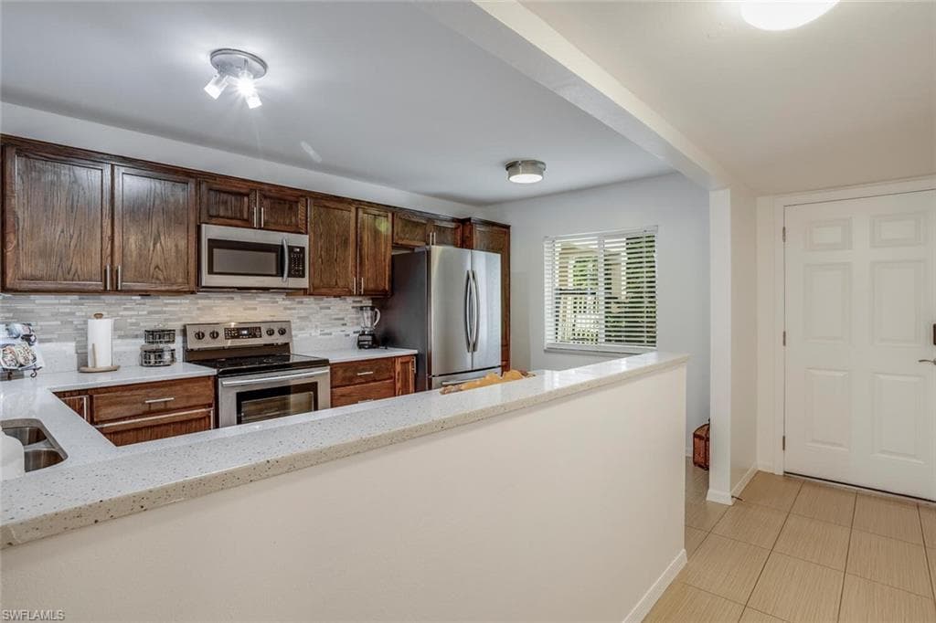 210 Timber Lake CIR # A103, NAPLES FL 34104-5