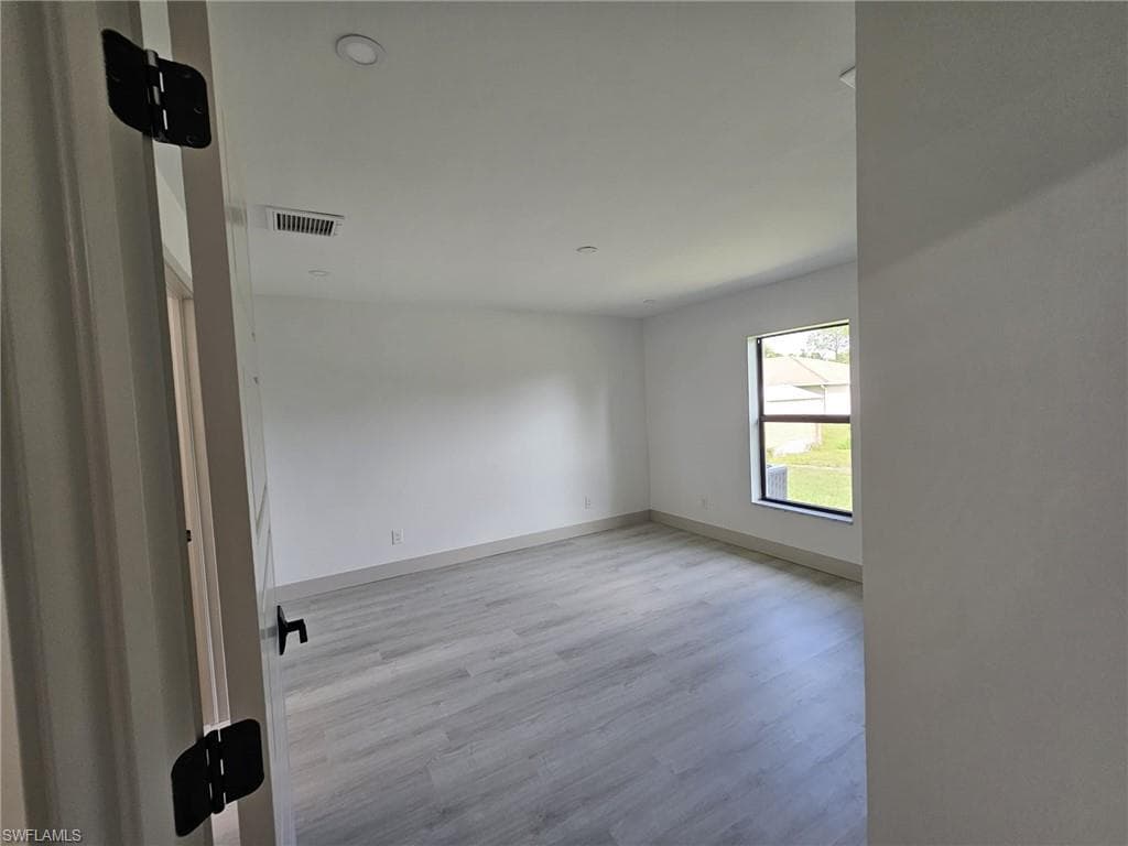719 Eisenhower, LEHIGH ACRES FL 33974-4