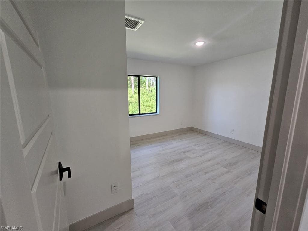 719 Eisenhower, LEHIGH ACRES FL 33974-3