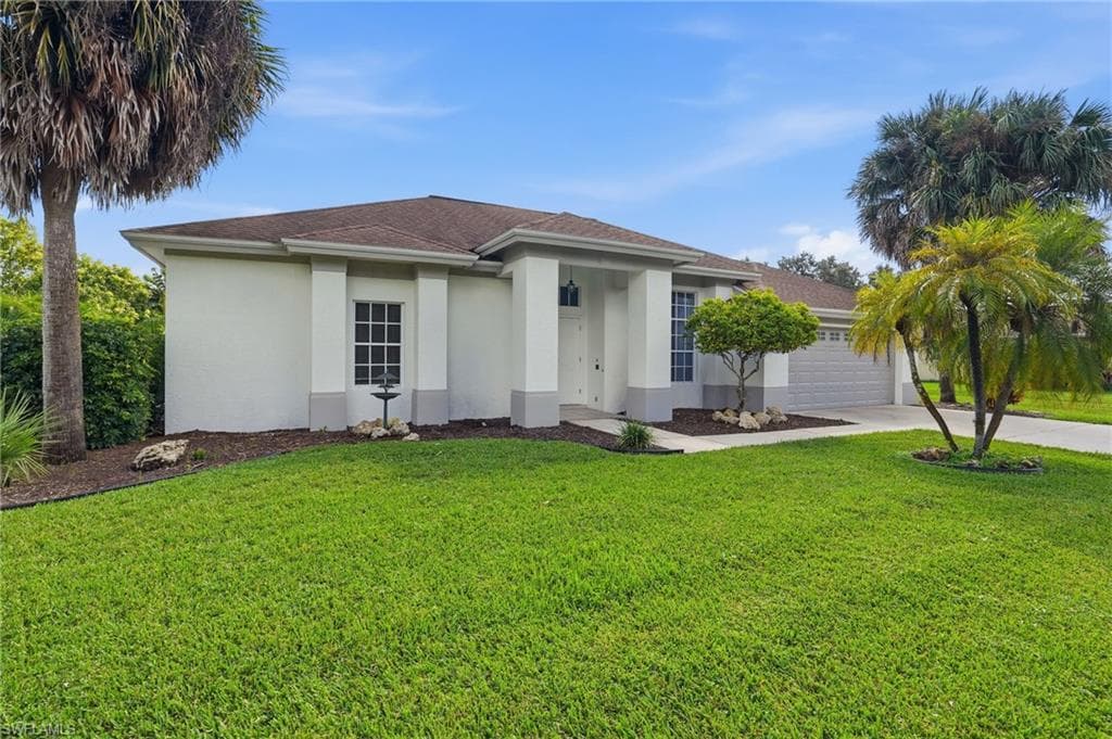571 Chamonix AVE S, LEHIGH ACRES FL 33974-1