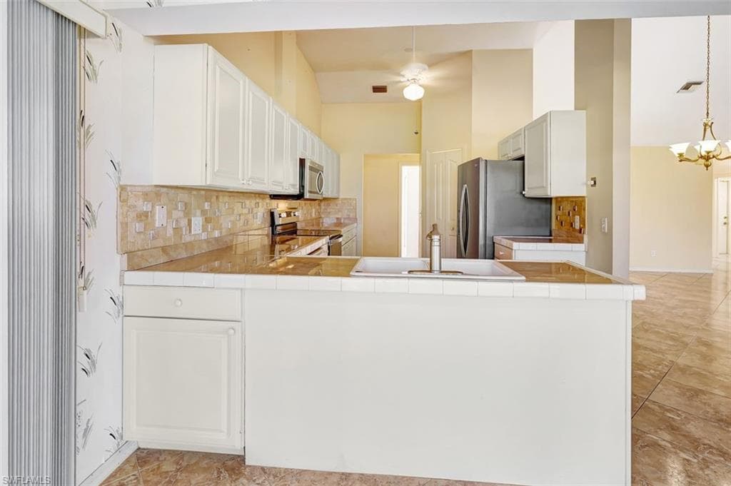 1574 NW 28th AVE, CAPE CORAL FL 33993-16