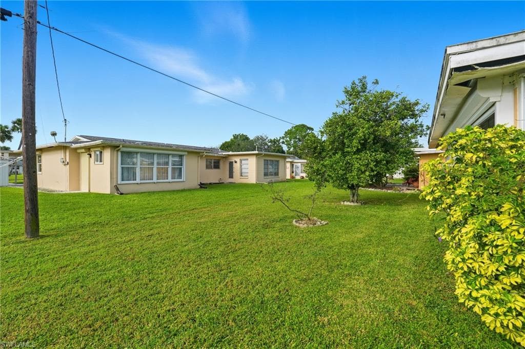 2210 Orchid RD E, LEHIGH ACRES FL 33936-15