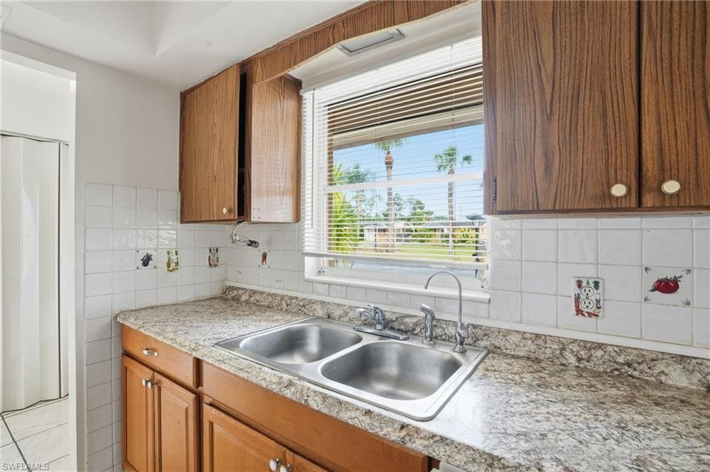 2210 Orchid RD E, LEHIGH ACRES FL 33936-6