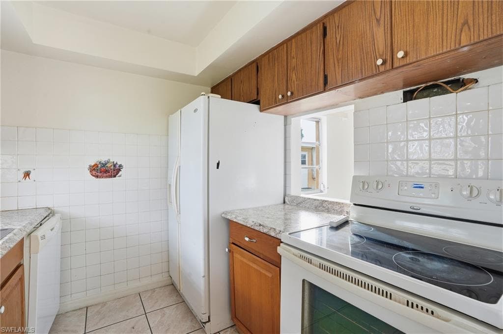 2210 Orchid RD E, LEHIGH ACRES FL 33936-24