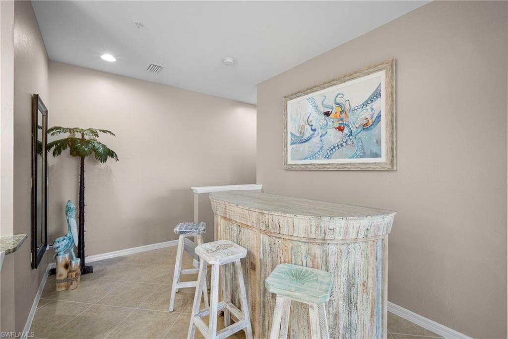 23520 Alamanda DR # 202, ESTERO FL 34135-7