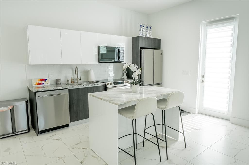 4064 Full Moon CT, NAPLES FL 34112-24