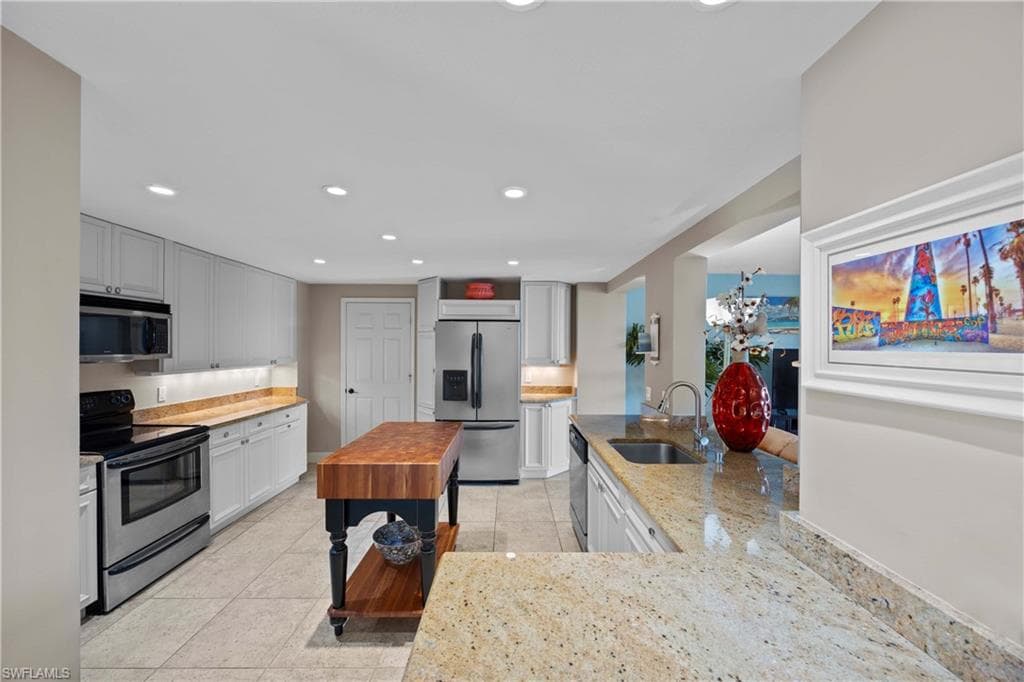 15 Bluebill AVE # 103s, NAPLES FL 34108-9