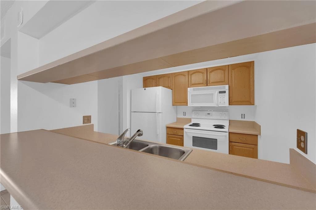 2875 Palm Beach BLVD # 205, FORT MYERS FL 33916-7