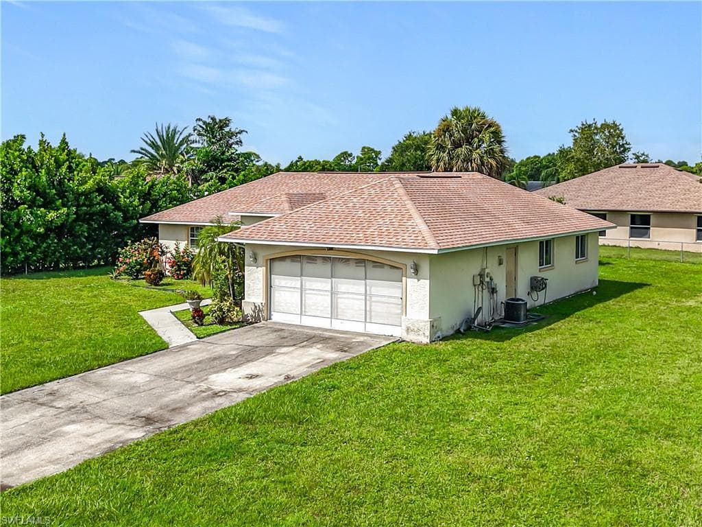 402 Chancery AVE, LEHIGH ACRES FL 33936-2