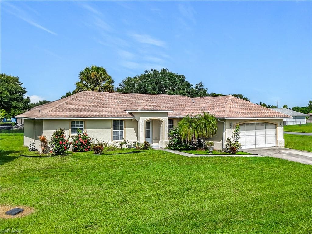 402 Chancery AVE, LEHIGH ACRES FL 33936-3