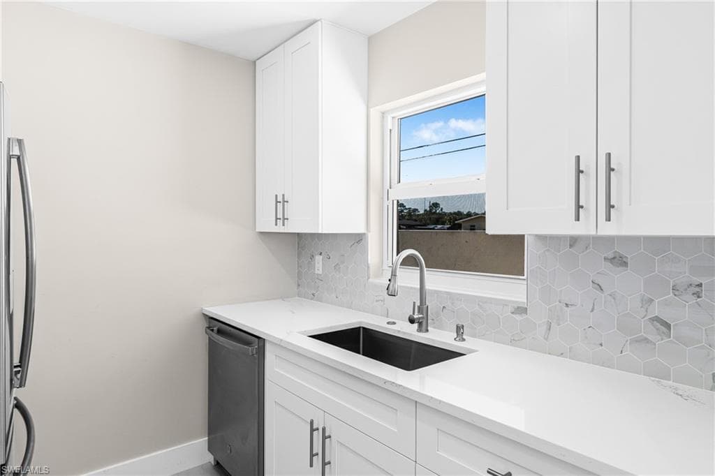 706 Joel BLVD, LEHIGH ACRES FL 33936-3