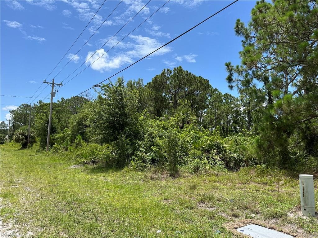 1016 MILWAUKEE BLVD, LEHIGH ACRES FL 33974-4
