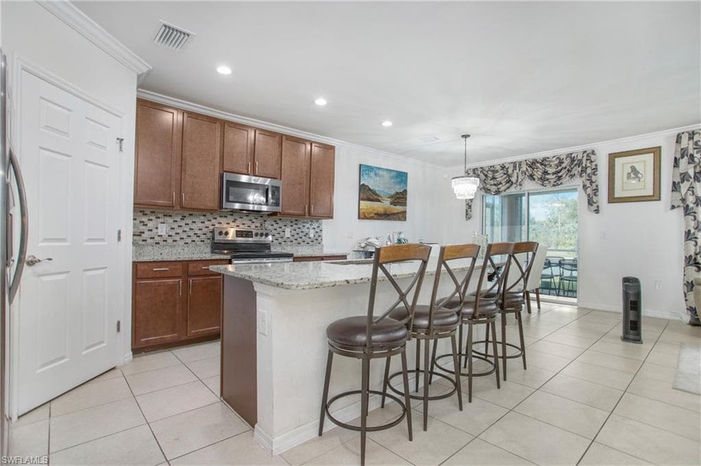 673 Hadley ST E, NAPLES FL 34104-9