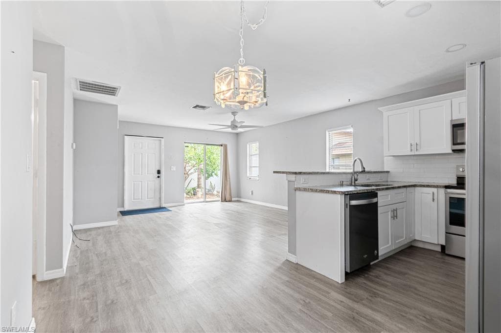 1031 SE 8th TER # 2H, CAPE CORAL FL 33990-13