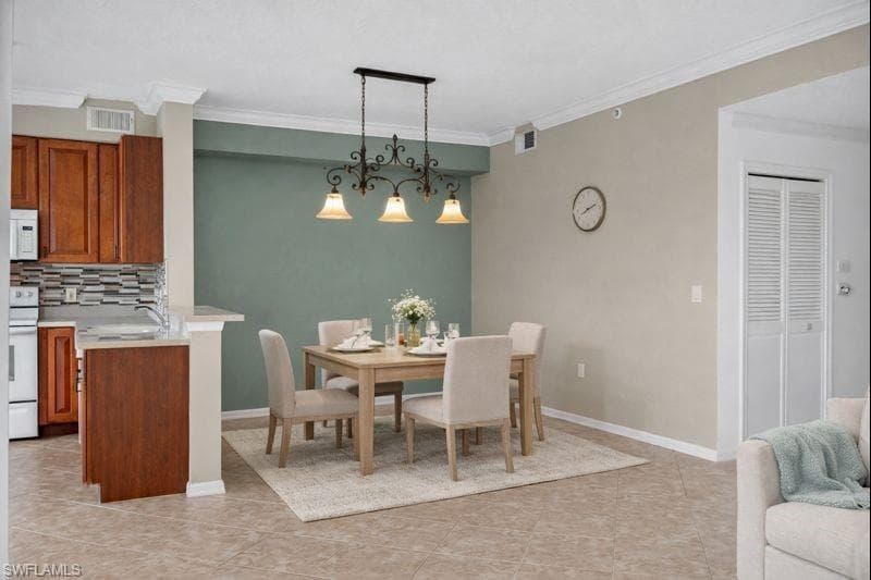 6816 STERLING GREENS PL # 303, NAPLES FL 34104-1