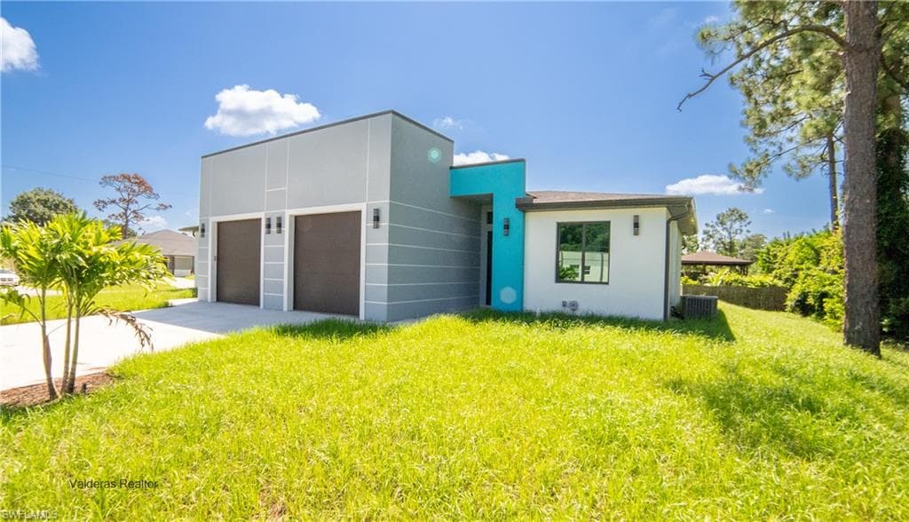 2401/2403 Matena AVE S, LEHIGH ACRES FL 33973-1