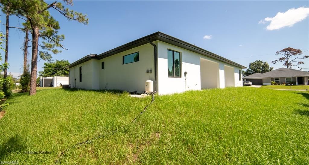 2401/2403 Matena AVE S, LEHIGH ACRES FL 33973-3