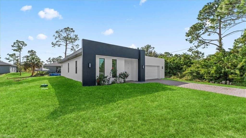 1218 Eclat ST E, LEHIGH ACRES FL 33974-2